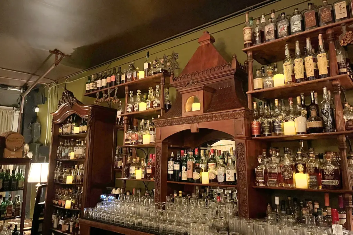 The bar area at the Crow and Quill bar which is a hidden bar and speakeasy in Asheville