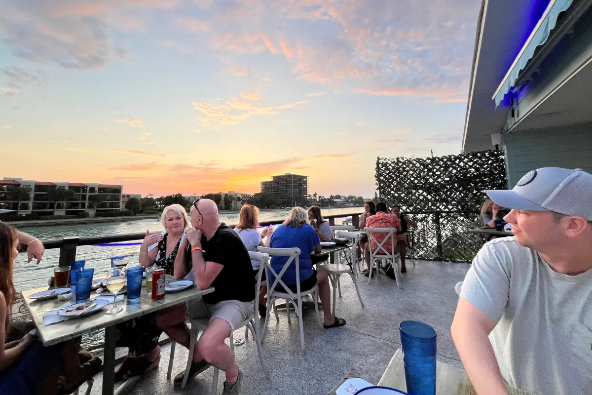 Sunset over the patio at Buoy's Waterfront in St Pete Beach FL