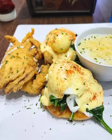 Eggs benedict and fried crab at Rick's Reef