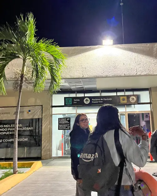 Group of people arriving at the Puerto Escondido Airport after flying in