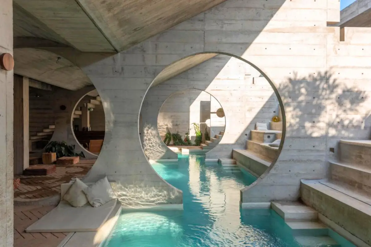 The iconic pool at Casa TO with beautiful circular architecture