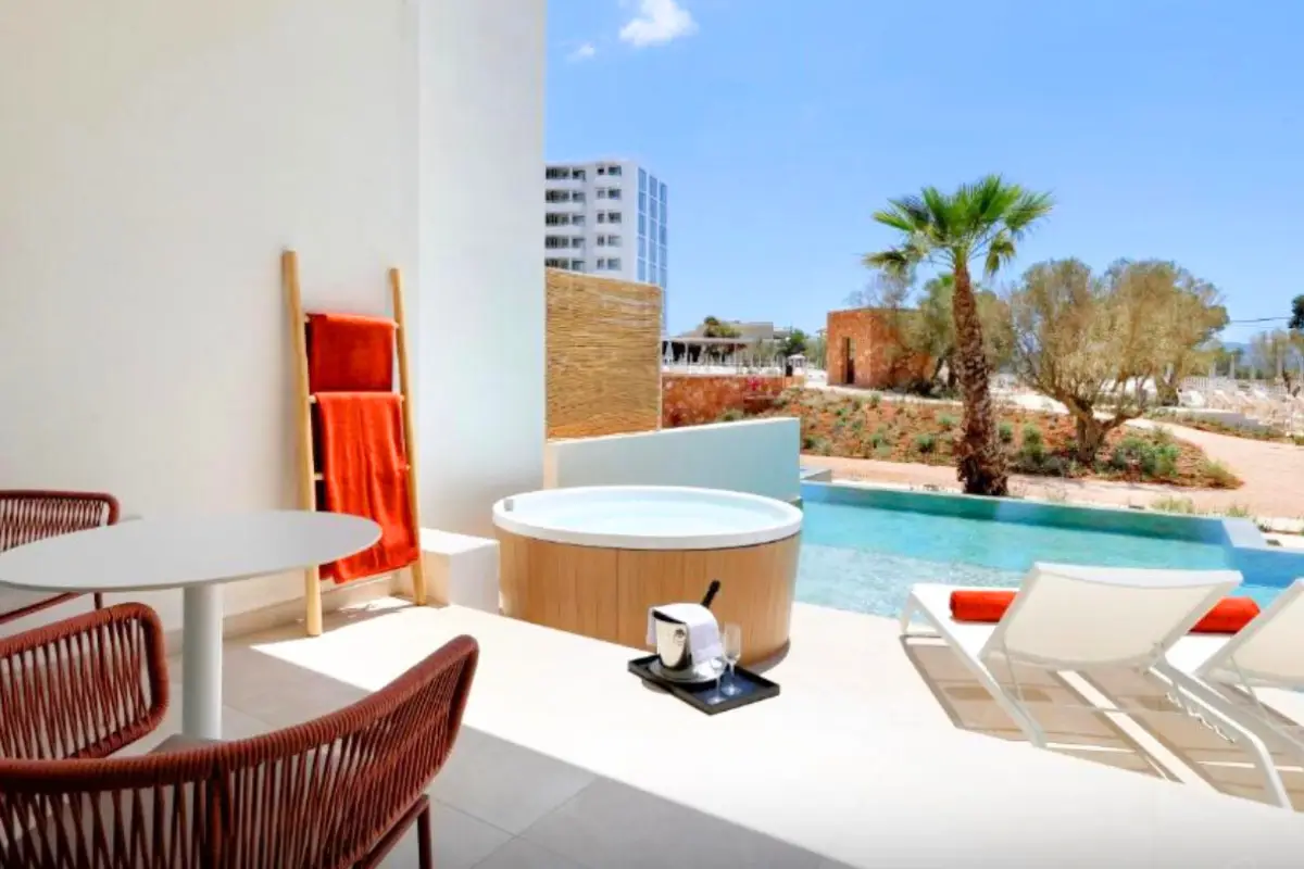 Room with a private jacuzzi and swim up sun deck at the TRS Ibiza, which shows that it is the best luxury option for where to stay in Ibiza near San Antonio