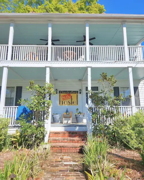 The exterior of the NotSo Hostel in Charleston on a sunny day, showing it's the #1 pick for where to stay in Charleston SC on a budget