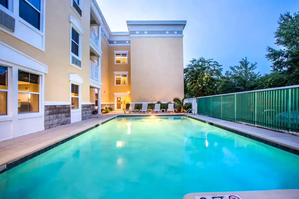 Basic pool glowing at dusk at the Comfort Suites Isle of Palms Connector hotel