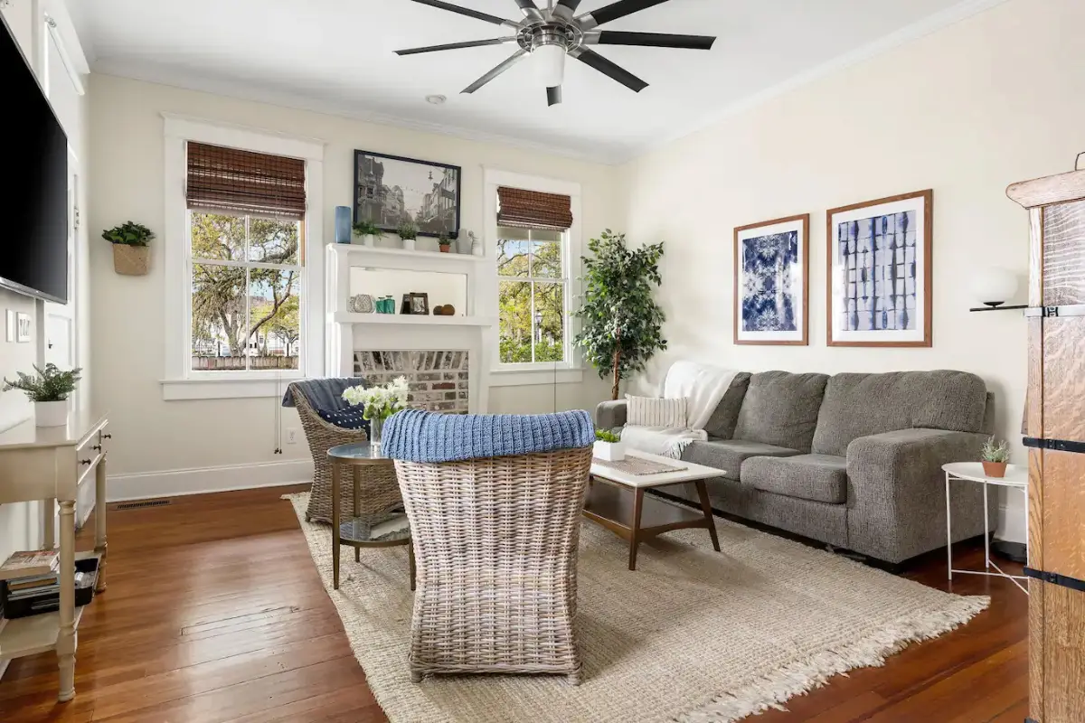 A bright and really well decorated living room in a one-bedroom Airbnb