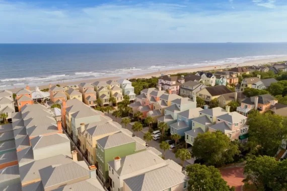 Cover image for the where to stay in Charleston SC blog by Inspired Backpacker, showing the rainbow houses of the Wild Dunes resort in Isle of Palms