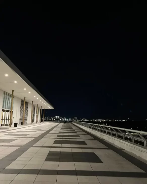 Kennedy Center's rooftop terrace large and empty at nighttime