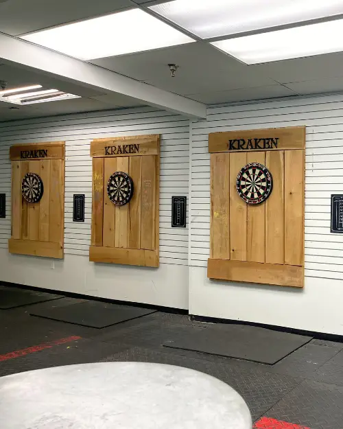 Three dart boards next to each other at Kraken