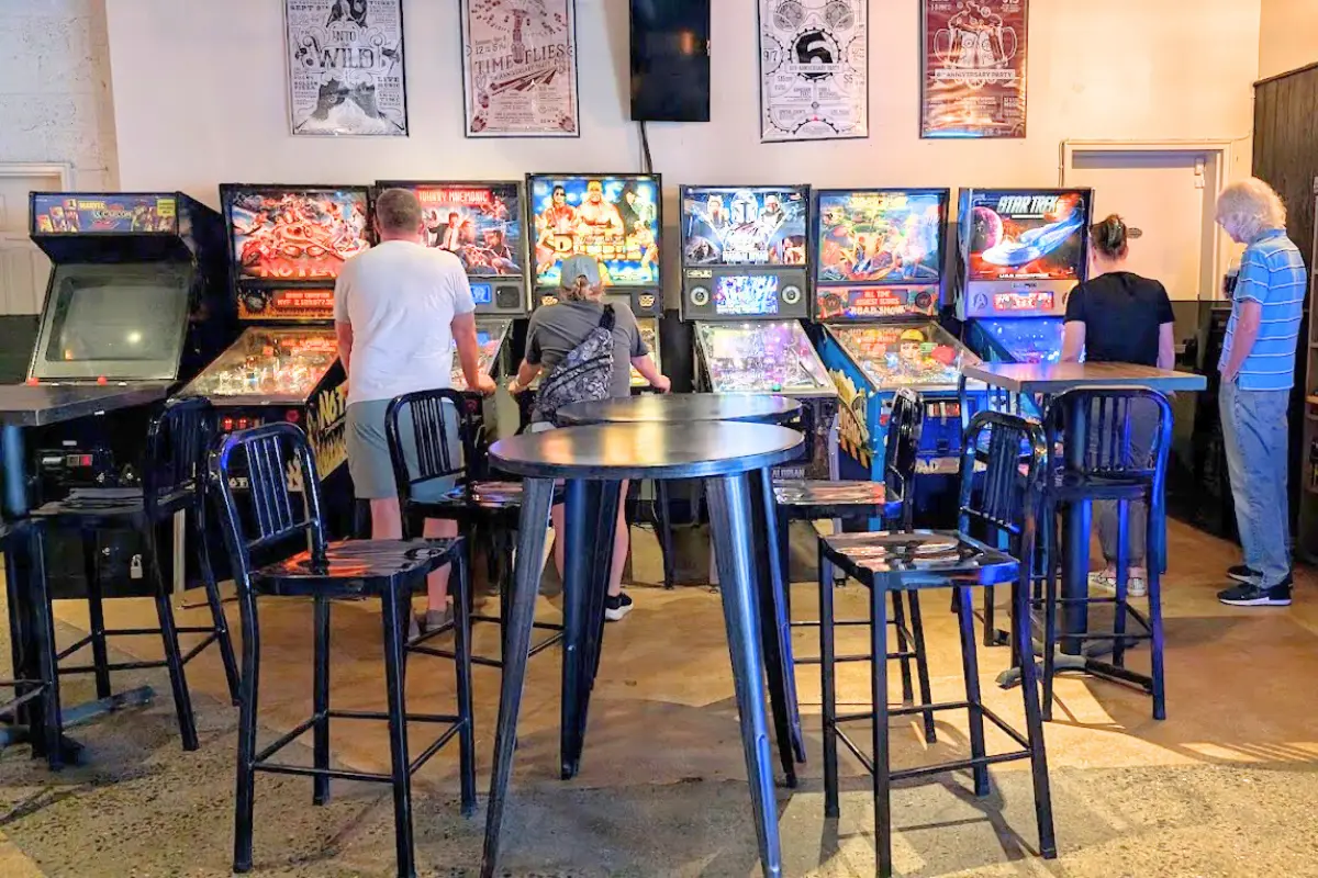 People playing arcade games at Atlas Ivy City