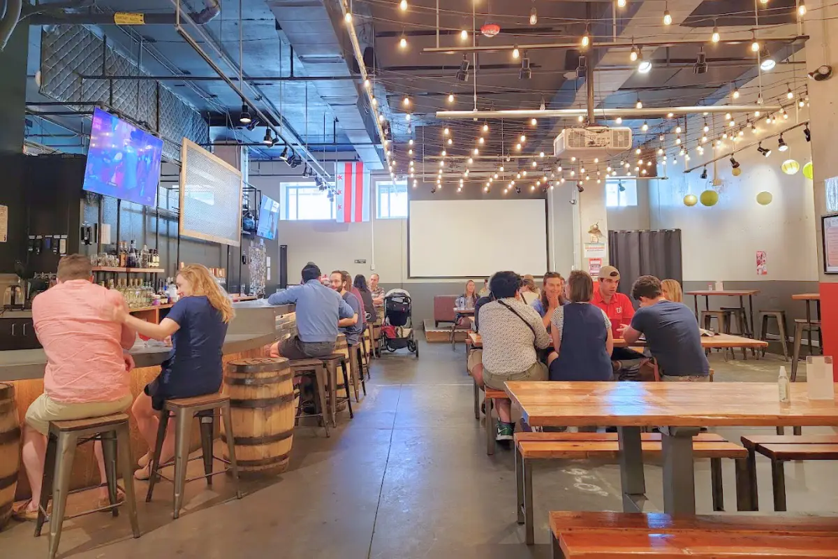 The indoor taproom at Red Bear Brewing with people hanging out enjoying themselves