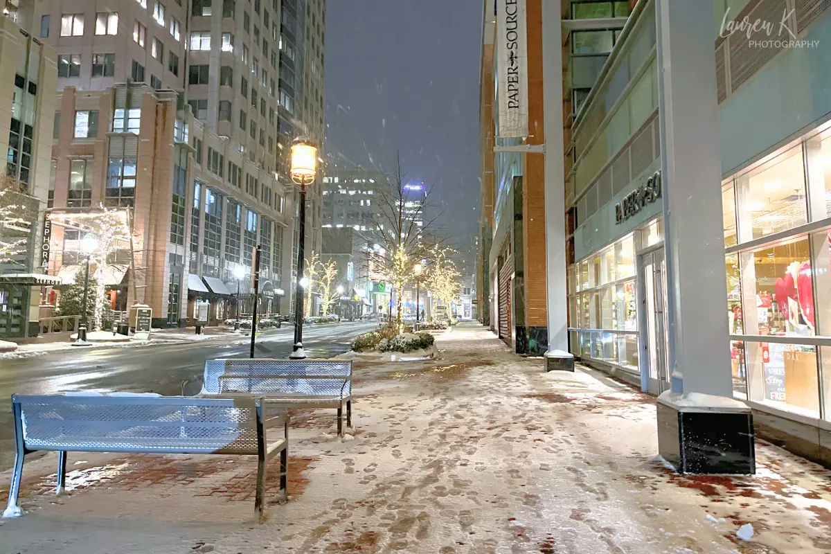 Reston Town Center shopping and dining benches during snow taken by Lauren of Inspired Backpacker