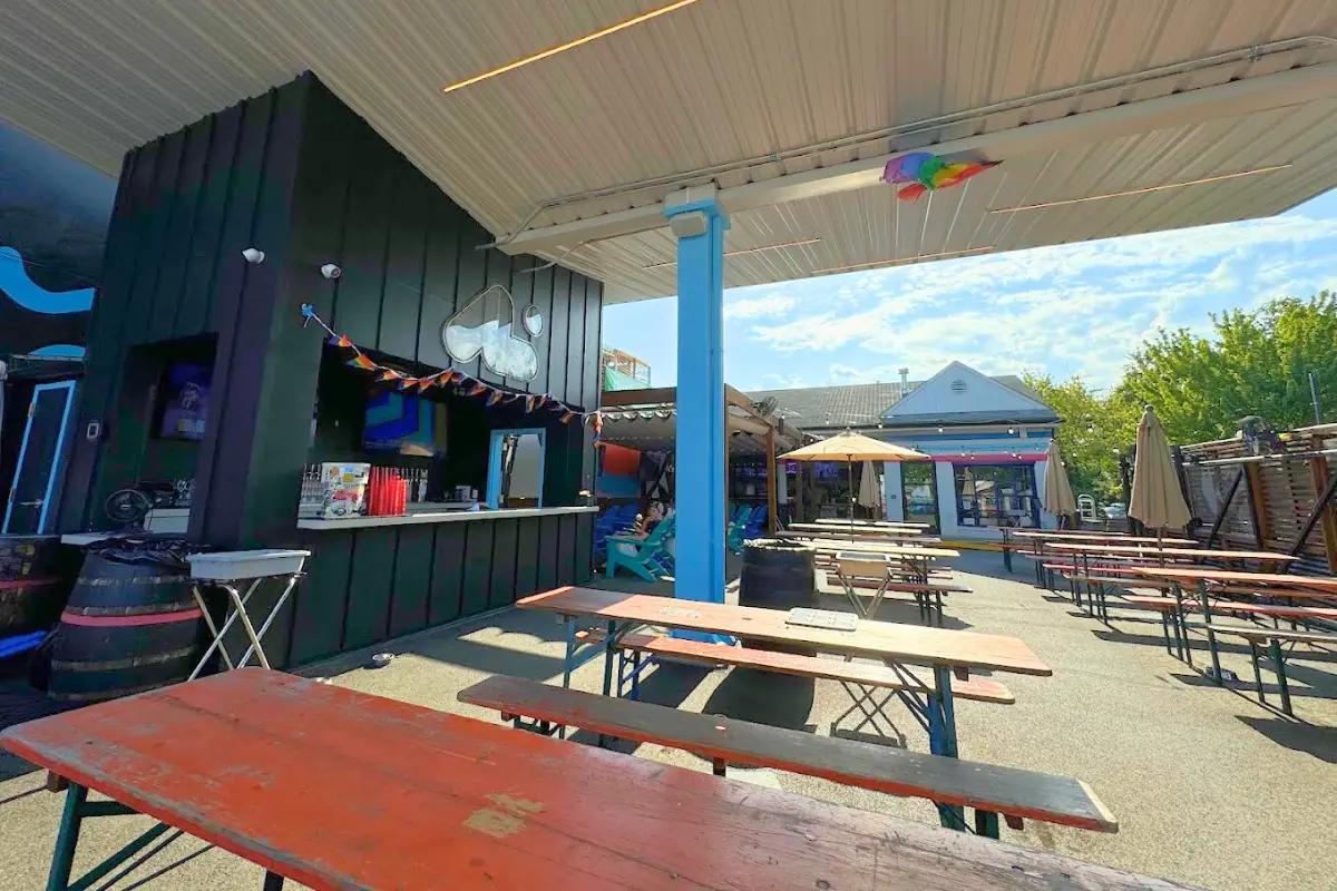 The covered beer garden at Aslin on a sunny day, which is one of the top Washington DC breweries for nice days and outdoor hangouts