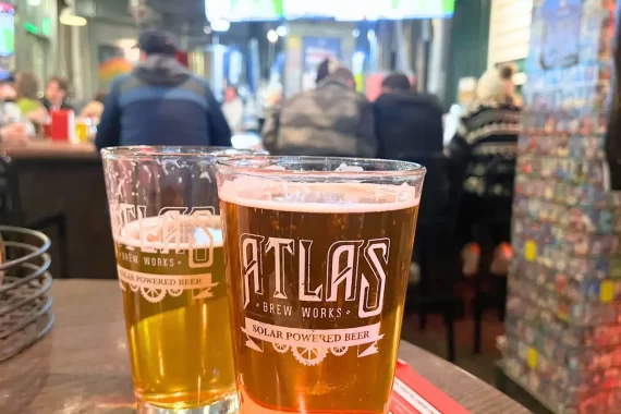 Washington DC breweries blog cover image, which shows 2 draft beers at Atlas brewing