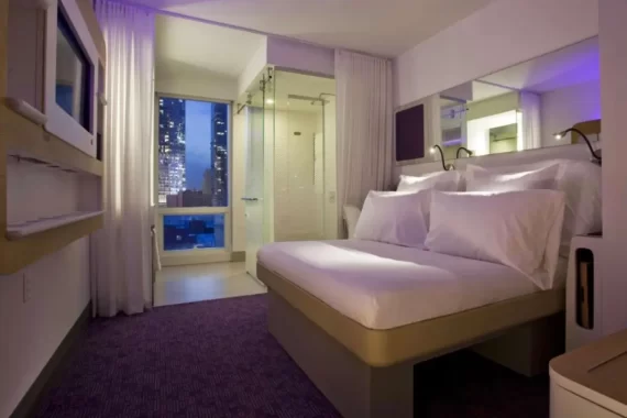 Cover image for the what is a micro hotel blog, which shows a room at the YOTEL NYC hotel