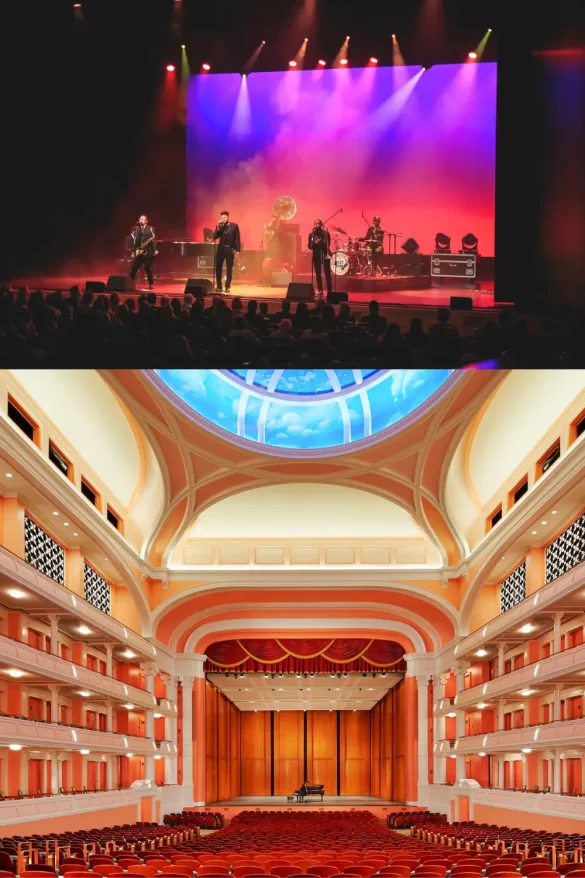 Musicians playing in front of a lit up screen on stage and the inside of the stunning Charleston Gaillard Center thaetre