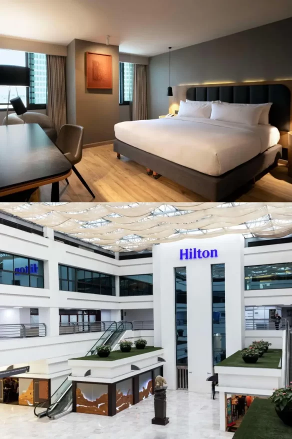 The lobby area of the Hilton Hotel with a big Hilton sign, and a modern, chic room with a king bed and a desk