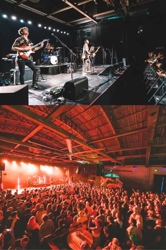 A rock band performing live on the stage with a crowded standing room warehouse-like area, to show that it's one of the most popular places for live music Charleston SC