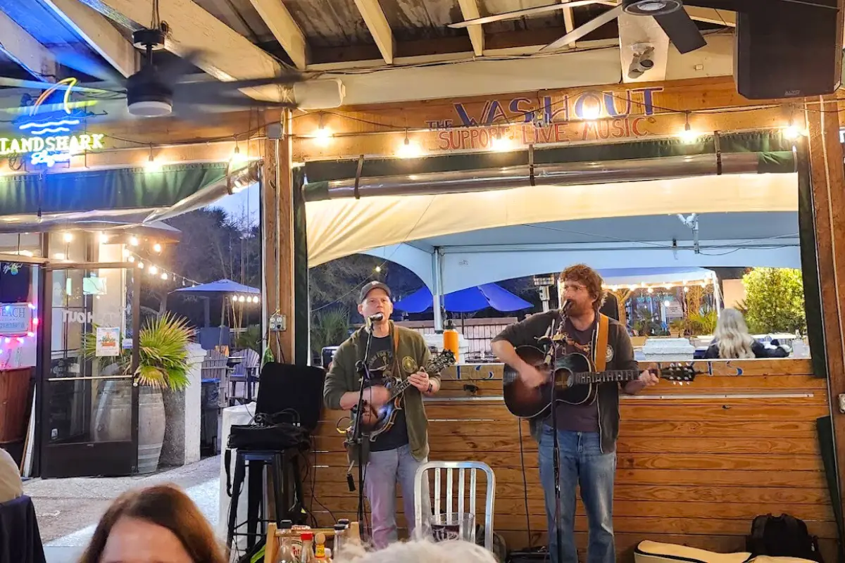 Band playing at The Washiut bar, showing that it’s the best spot for live music Folly Beach SC with regular bands all year 