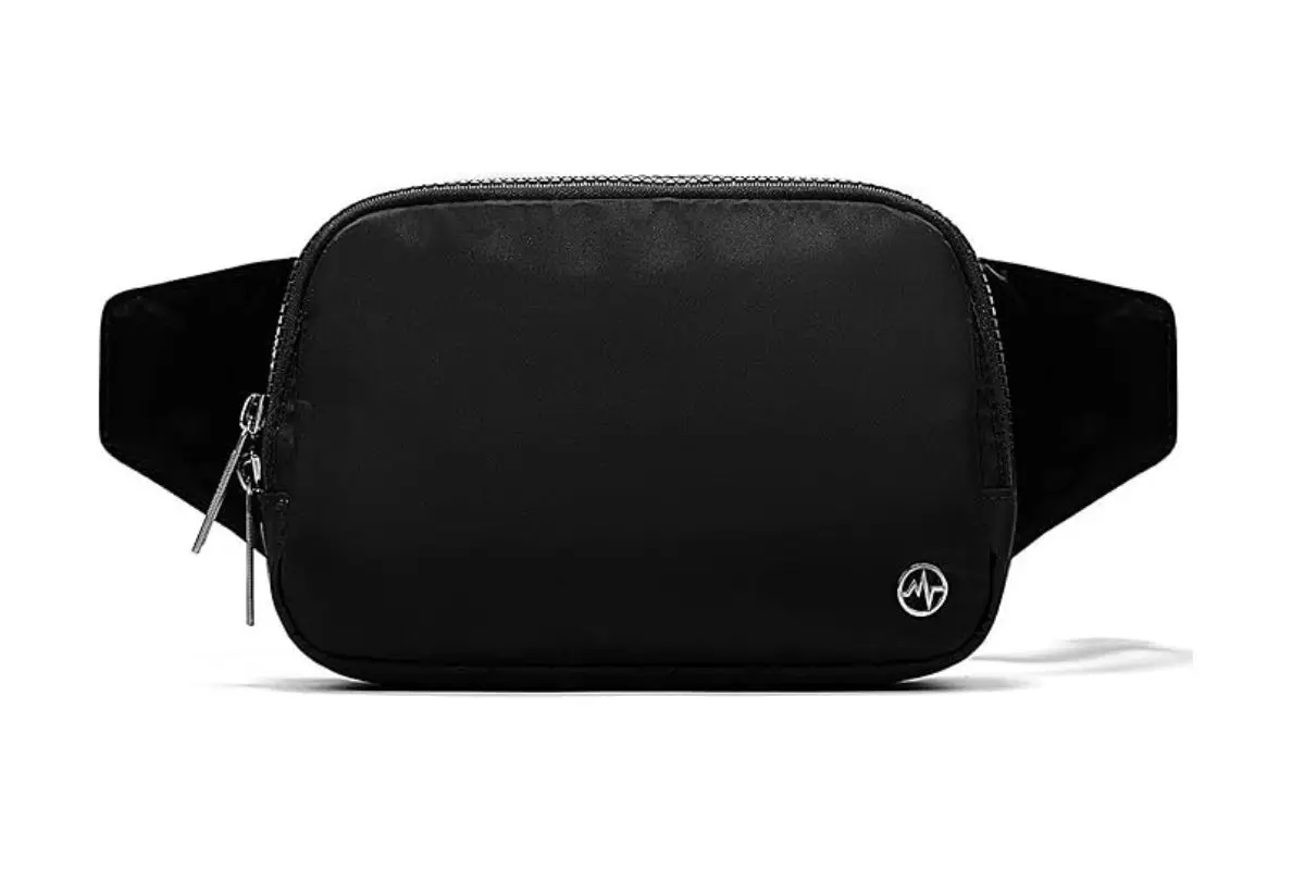 Black small fanny pack, an important item on the digital nomad packing list especially for women, for carrying the things with you that you need while being hands-free, great for long-term travel