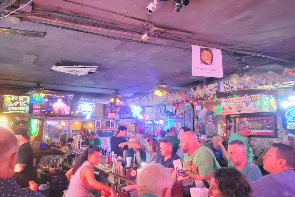 Drunken Clam bar, which is a locals St Pete Beach bar with lots of peolpe inside ordering drinks