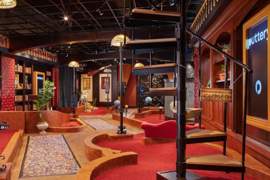 Library course at the Puttery, offering cocktails and themed indoor putt putt Charlotte NC