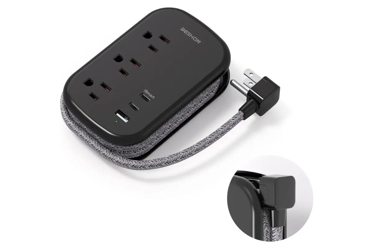 Black travel power cord with a cord that wraps around it to make it compact